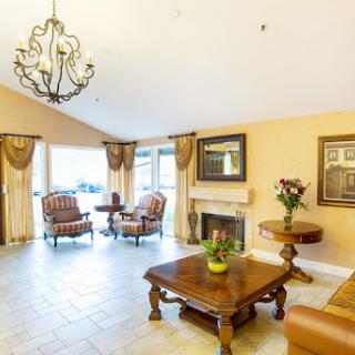 A cozy and elegantly designed living room featuring warm colors, stylish furniture, and a welcoming atmosphere.