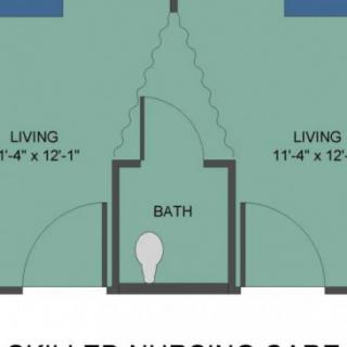 Floor plan showing a layout with two living rooms and a central bathroom.