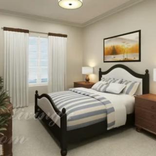 A cozy bedroom featuring a striped bedspread, bedside tables with lamps, and a framed painting above the bed.