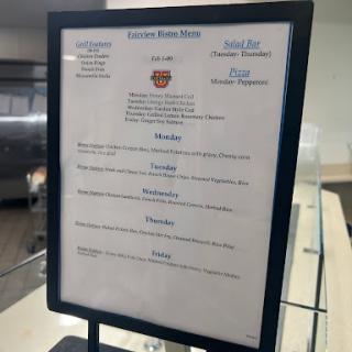 A menu board displaying daily specials and prices at a restaurant.