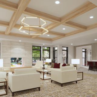 A beautifully designed living room featuring modern furniture and elegant lighting.