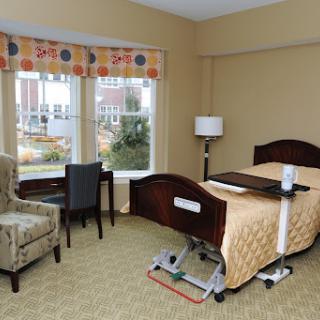 A well-equipped hospital room designed for patient comfort and care.