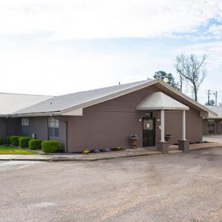 A well-maintained residential building with a welcoming entrance.