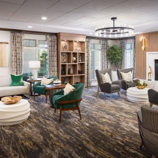 A modern living room with elegant furniture and stylish decor.