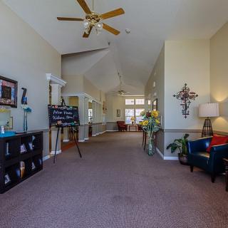 A spacious lobby area with comfortable seating and decorative elements.