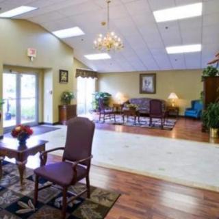 A spacious lobby with comfortable seating and elegant decor.