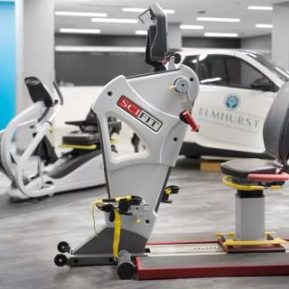 A modern gym featuring advanced exercise equipment and workout machines.