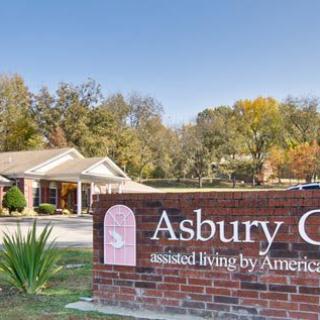 Entrance sign for Asbury Care assisted living facility.