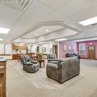 A spacious office lobby with comfortable seating and modern decor.