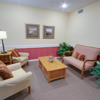 A cozy living room with comfortable seating and warm decor.