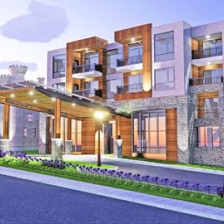 A contemporary residential building showcasing a blend of modern architectural elements and landscaped surroundings.