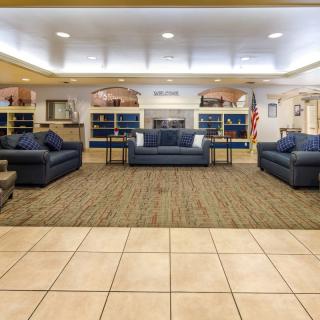 A spacious lobby with comfortable seating arrangements and a welcoming atmosphere.