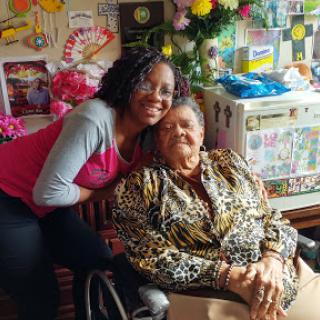 A joyful moment shared between two generations, capturing love and laughter.