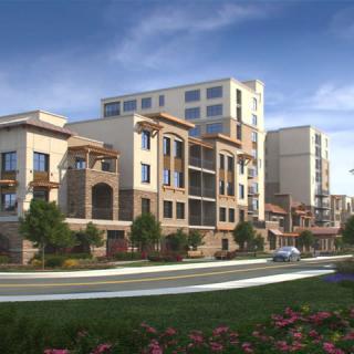 A modern apartment complex with multi-story buildings and landscaped surroundings.