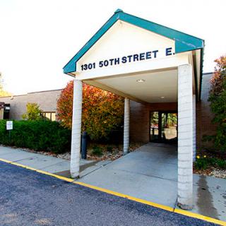 The entrance of a building located at 1931 50th Street E.