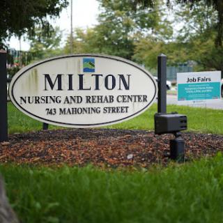 A sign indicating the Milton Nursing and Rehab Center located on Mahoning Street.