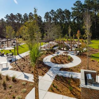 A scenic park with winding pathways and lush greenery.