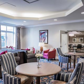 A modern lounge area with comfortable seating and stylish decor.