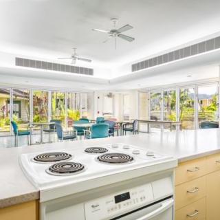 A bright and spacious modern kitchen with an open-plan dining area.