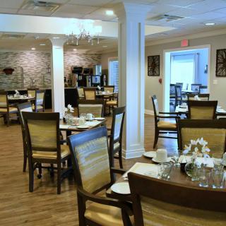 A cozy restaurant dining area with neatly arranged tables and chairs.