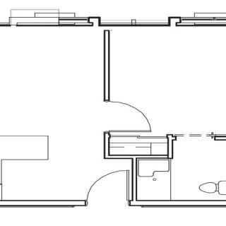 A simple floor plan showing the layout of an apartment with a kitchen, bathroom, and living area.