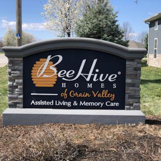 Entrance sign for BeeHive Homes of Glen Valley, offering assisted living and memory care services.
