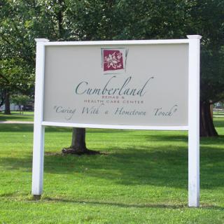 Sign for Cumberland Park, inviting visitors to enjoy the green space.