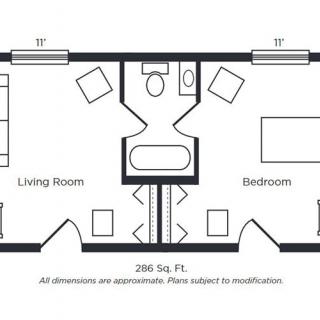 A 265 square foot apartment floor plan featuring a living room, bedroom, and bathroom.
