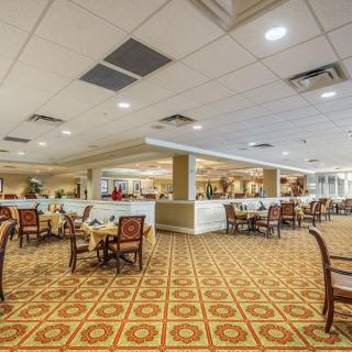 Spacious restaurant dining area with elegant decor and ample seating.