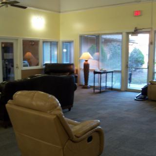 A cozy lobby area with comfortable seating and warm lighting.