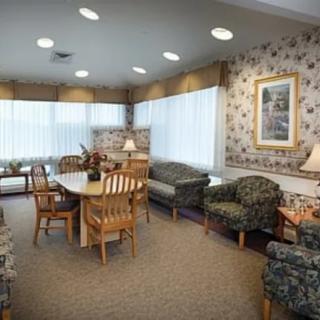 A cozy living room with comfortable seating and warm decor.