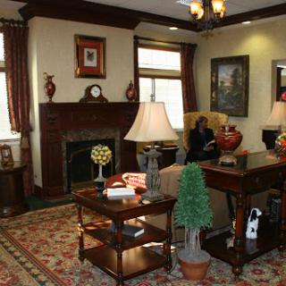 A cozy living room featuring elegant furniture and warm decor.