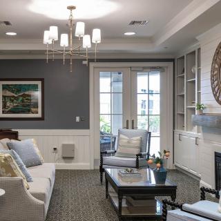 A modern living room with elegant furnishings and decor.