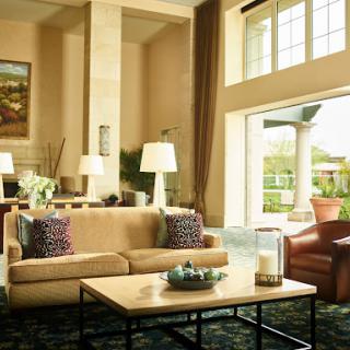 A stylish and inviting living room with comfortable seating and ample natural light.