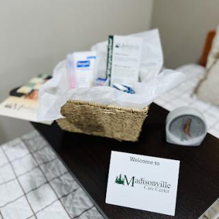 A warm welcome with a basket of amenities for guests, including a personalized note.