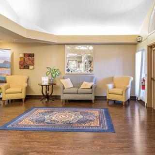 A cozy lobby area with comfortable seating and elegant decor.