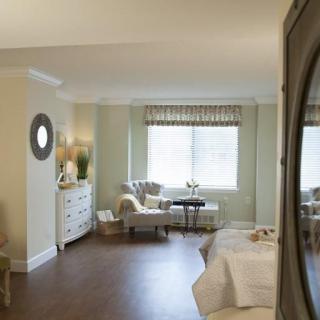 A chic and cozy living room with elegant decor and soft lighting.