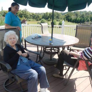 A peaceful afternoon with seniors enjoying the outdoors.