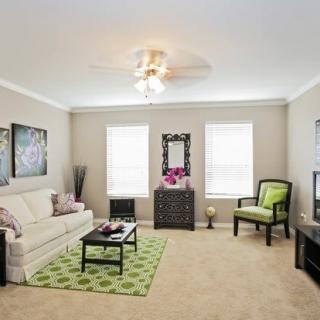 A modern living room with stylish furniture and decor.