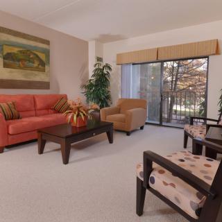 A cozy living room with comfortable seating and tasteful decor.