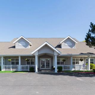 A large residential house with a welcoming entrance and porch.