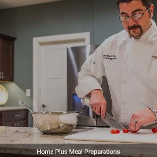 A chef preparing ingredients in a modern kitchen.