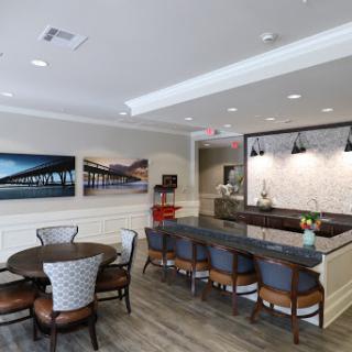 A modern lobby and dining area featuring stylish furniture and a welcoming atmosphere.