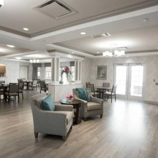 A modern living area with comfortable seating and elegant lighting.