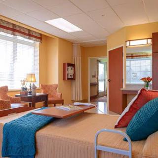 A welcoming and comfortable hospital room designed for patient care.