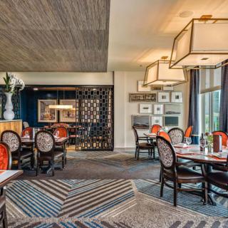 Elegant restaurant interior with stylish decor and comfortable seating.