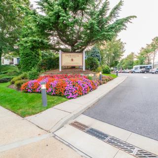 Beautiful floral arrangement at the entrance of a residential area.
