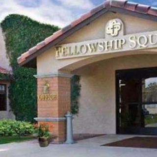 The entrance to Fellowship Square, showcasing inviting architecture and well-maintained landscaping.