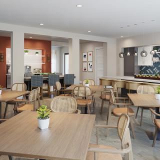 A modern cafe interior with wooden tables, chairs, and decorative plants.
