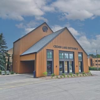 A modern wooden building showcasing contemporary architectural design.